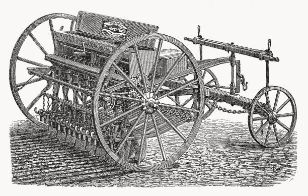 Historical seed drill. Wood engraving, published in 1893.