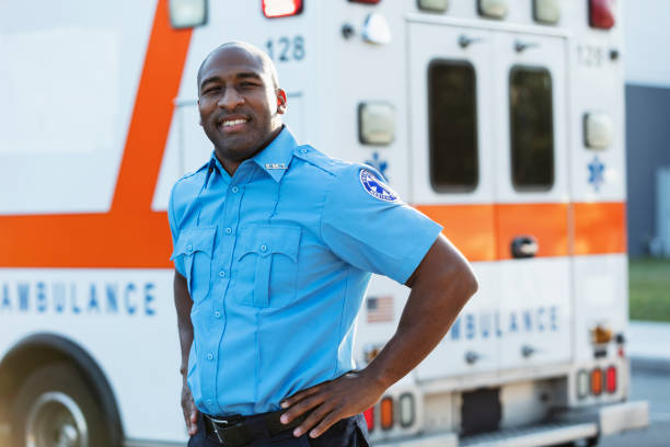 istock Paramedic in front of ambulance 1310106060