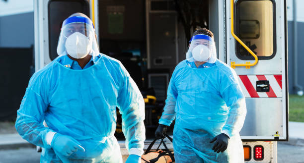 istock Paramedics working, wearing PPE during COVID-19 1310106091