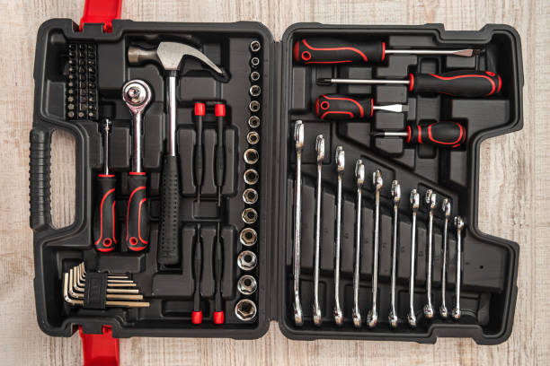 istock new set of wrenches and bits in tool box on wooden desk 1310106580