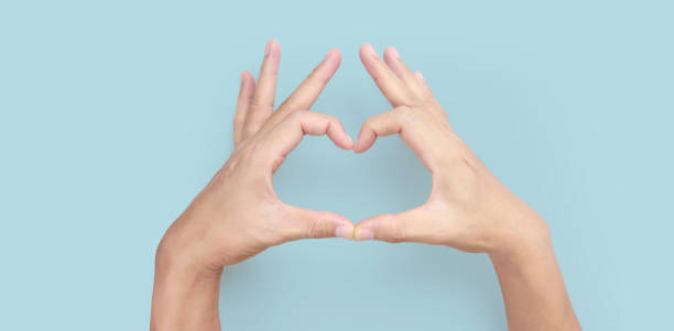 istock Hands making sign Heart isolated. Beautiful hands  with copy space 1310107182