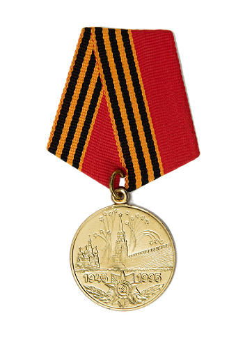 A gold medal, isolated on white.