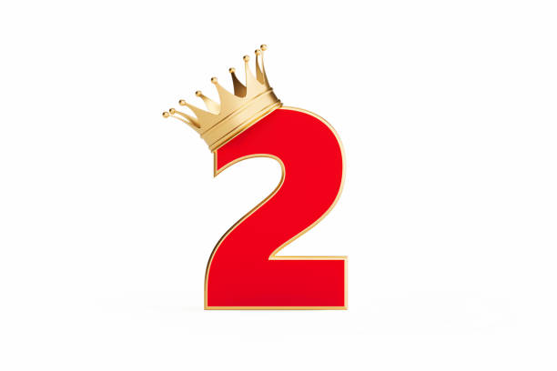 istock Number Two Wearing Gold Crown Isolated On White Background 1310108613