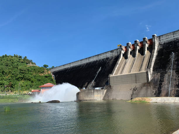 istock Water flowing over sluice way of hydropower dam 1310111454