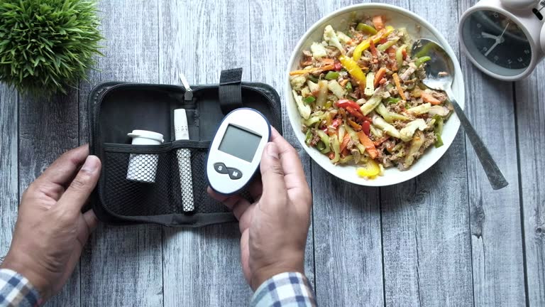 diabetic measurement tools and healthy food salad on table