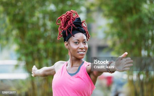 Africanamerican Woman Doing Yoga Outdoors Stock Photo - Download Image Now - African-American Ethnicity, Exercising, One Woman Only