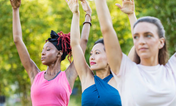 istock Three multi-ethnic woman in yoga class outdoors 1310112185