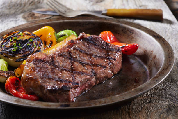 istock BBQ Venison (Elk) New York Strip Steak with Roasted Vegetables 1310113456
