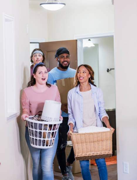 istock Young adults moving into an apartment 1310113713