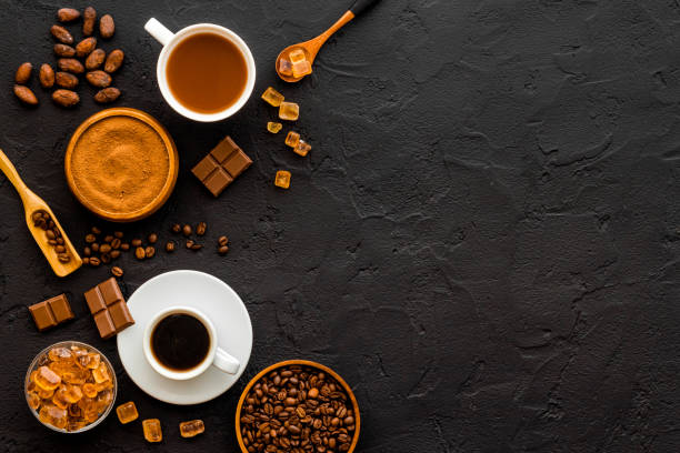 istock Coffee and cocoa beans and powder. Chocolate and coffee background 1310114422