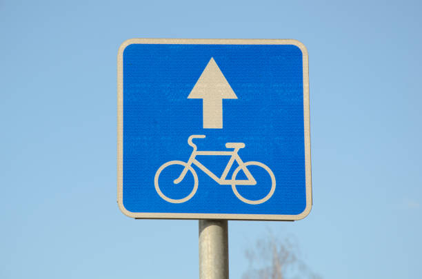 istock Blue square metal traffic sign Bicycle Traffic with reflective surface against blue sky 1310118241