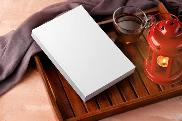 istock Blank White Book with Tea and Lamp for Mockups 1310119496