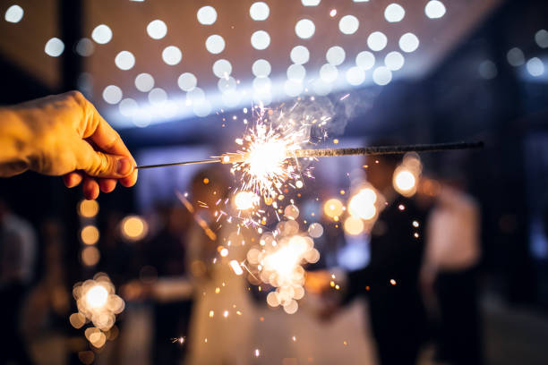 istock sparkler burns in hand.happy new year 2022 1310122470