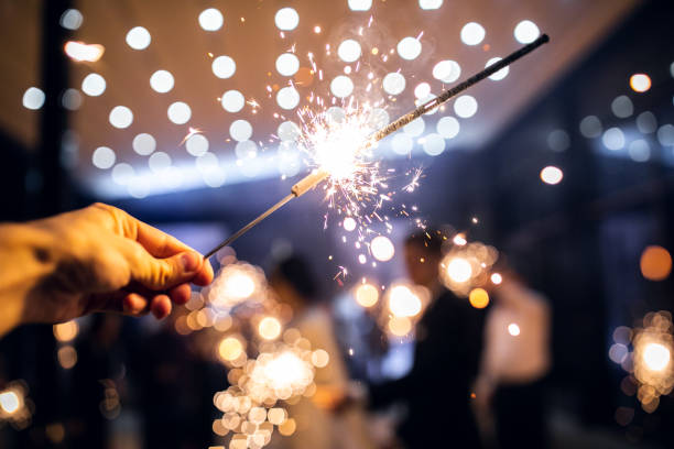 istock sparkler burns in hand.happy new year 2022 1310122521