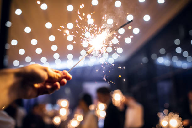 istock sparkler burns in hand.happy new year 2022 1310123061