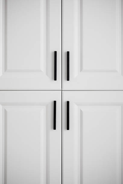 istock Simple, comfortable and clean white wardrobe door 1310123082