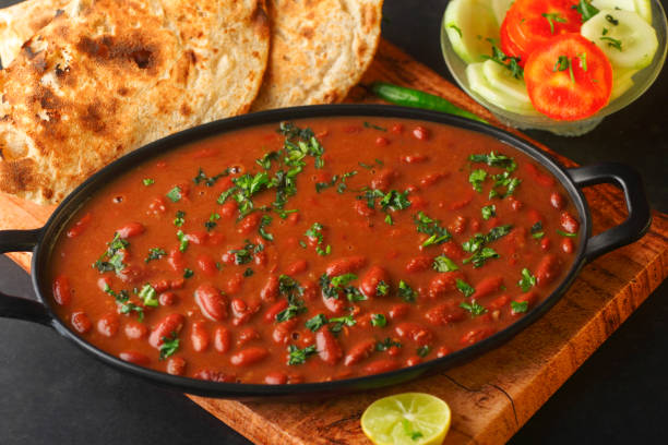Rajma - an indian food Rajma chawal- typical north Indian main course, kidney bean curry and boiled rice with roti rice bowl restaurant stock pictures, royalty-free photos & images