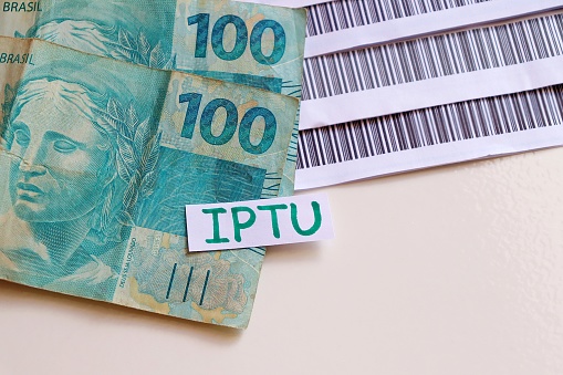 IPTU - Imposto Predial e Territorial Urbano (Brazilian Land and Urban tax). Payment concept.