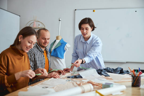 istock Talented enthusiastic team working at the new project 1310134212