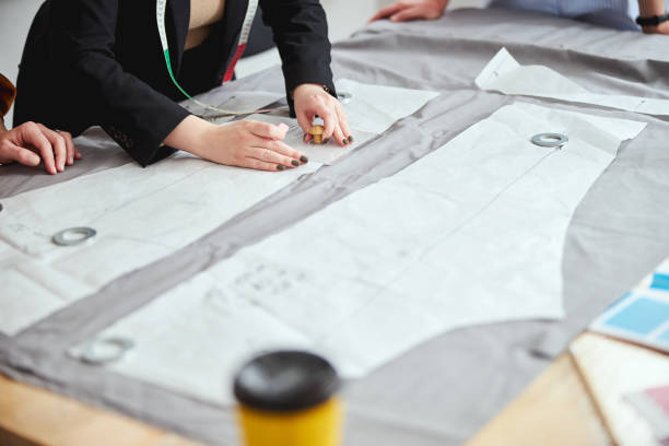 istock Large piece of sewing pattern in tailoring establishment 1310134301