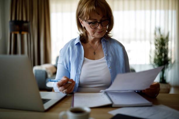 istock Senior woman working at home 1310134756