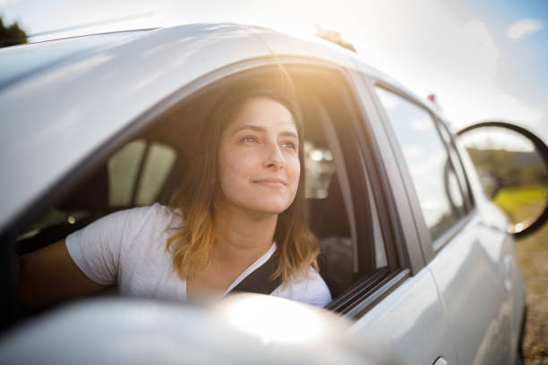 Woman looking outside the car window