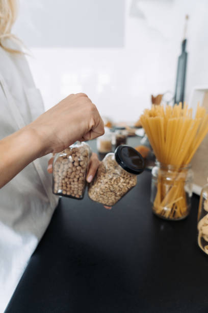 istock Woman preparing chickpeas for breakfast, close course 1310137427