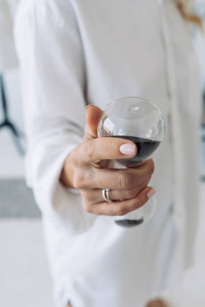 istock Woman holding hourglass 1310137450