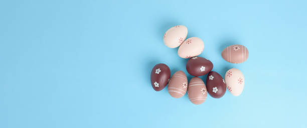 istock long festive easter background in blue color. decorative eggs, minimalistic holiday concept. copy space, flat lay 1310138603