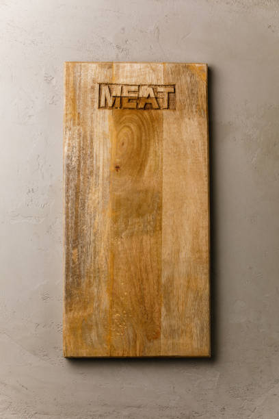 istock Wooden cutting board for Meat background on Gray concrete background copy space 1310138638