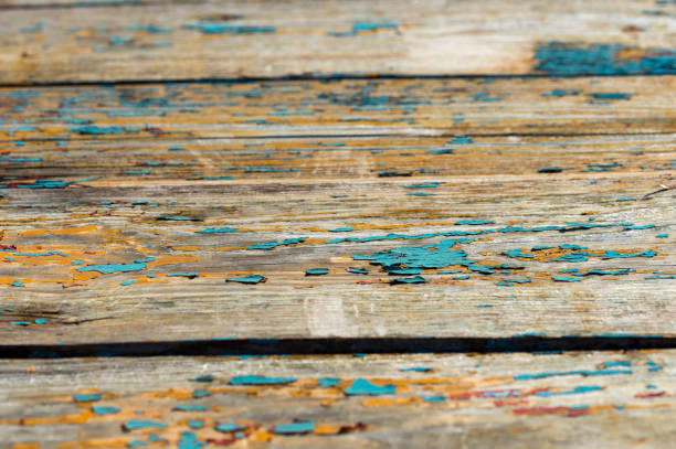 Wooden surface with shabby blue paint