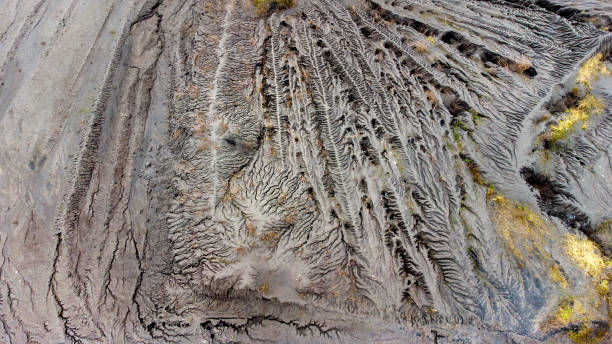 istock Abstract aerial view of building rubble disposal site 1310144376