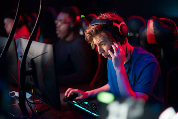 istock A young guy gets a phone call during an online video game 1310145810