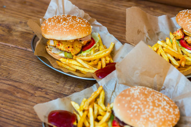 istock hamburgers with chicken fillet and beef fried potatoes 1310145928
