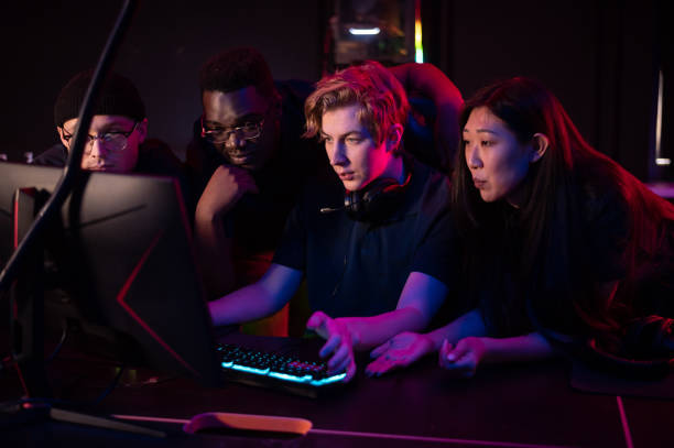 istock Cyber gamers broadcast live from their training ground, communicate with their fans live 1310146024