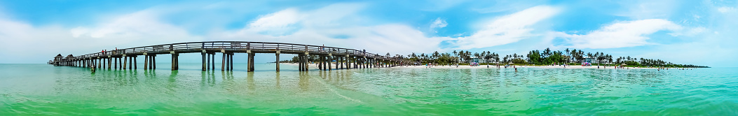 Panorama of Vanderbilt beach in Naples, Florida. Naples is located on the gulf of Mexico coast in southern Florida, US.