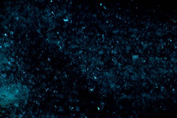 istock Petrol or teal abstract crystal glittering background 1310149031