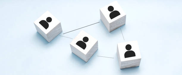 istock Wooden blocks connected together on a blue background. Teamwork concept 1310151478
