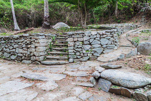 Restos de una casa de indígenas Kogi en el Parque Nacional Tayrona, Colombia photo