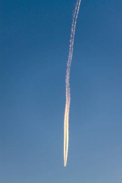 istock Condensation trail of an airplane 1310154051