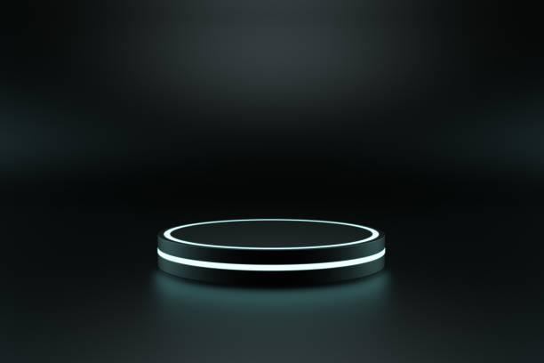istock Black podium isolated on a dark background 1310159647