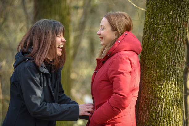 istock Two friends having fun and laughing 1310159787