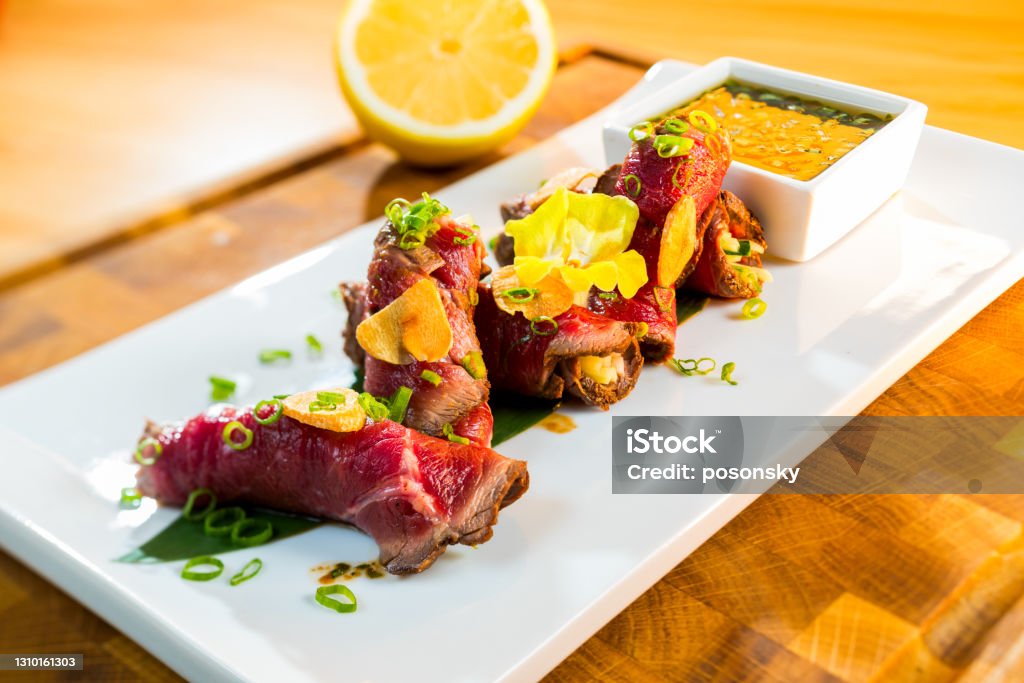 marinated and fried pieces of veal in rolls, tataki rolls, selective focusing, Tataki Stock Photo
