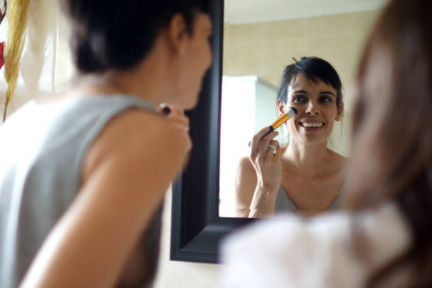 istock mother and daughter makeup in the bathroom 1310162893