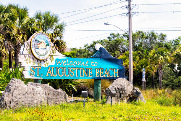 Welcome to St. Augustine Beach small town city, Florida sign in summer established in 1959 on Atlantic ocean waterfront park St. Augustine Beach, USA - May 10, 2018: Welcome to St. Augustine Beach small town city, Florida sign in summer established in 1959 on Atlantic ocean waterfront park 1959 photos stock pictures, royalty-free photos & images