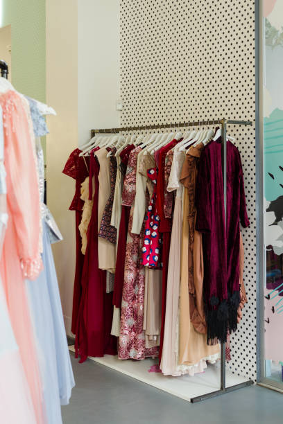 istock Stand for hangers with women's dresses 1310166442