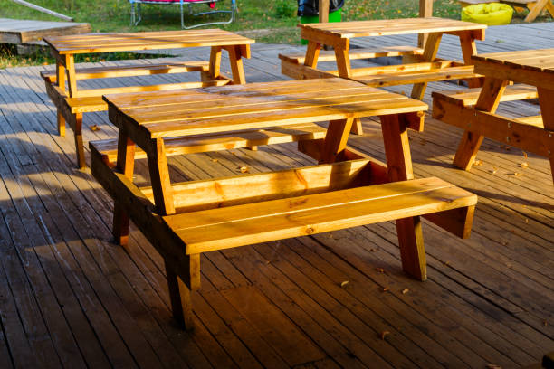 istock wooden table and bench on the street 1310166532