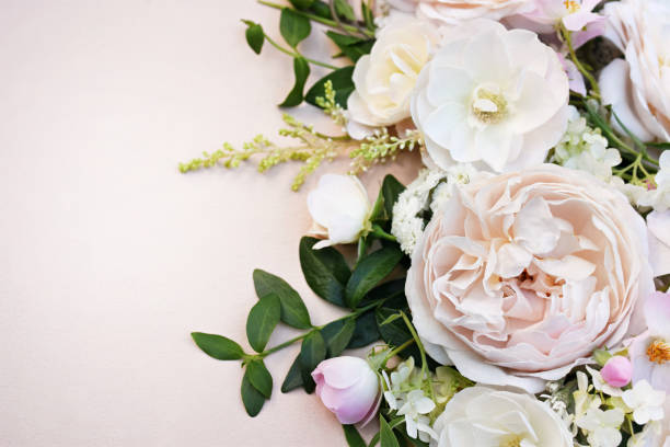 istock Delicate blooming festive white and pink rose background, blossoming flowers soft pastel frame 1310172503