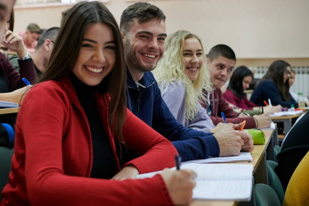 istock Students Gruop In the uni Amphitheather 1310173325