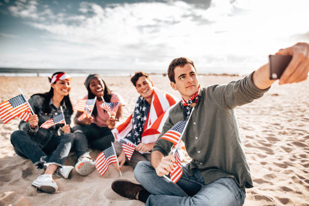 istock happiness friends all together with us flag take a selfie 1310173711